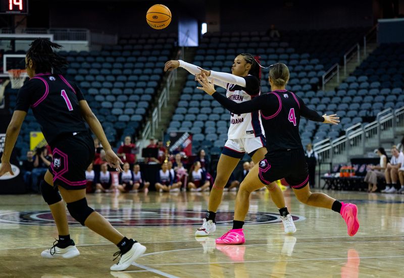 Southern Indiana's Amiyah Buchanan (24) passes as the University of Southern Indiana Screaming Eagles play the SIU-Edwardsville Cougars during the quarterfinal round of the 2026 Ohio Valley Conference Women's Basketball championship games at Ford Center Thursday, March 5, 2026.