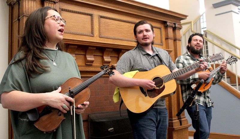 Blue Flame, left to right, Savannah Musgrove, Luke Lovejoy and Ethan Batan perform at the Bedford Public Library Thursday, March 5, 2026.