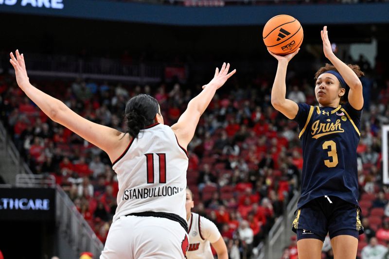 Mar 1, 2026; Louisville, Kentucky, USA; Notre Dame Fighting Irish guard Hannah Hidalgo (3) shoots against Louisville Cardinals forward Elif Istanbulluoglu (11) during the second half at KFC Yum! Center. Notre Dame defeated Louisville 65-62. Mandatory Credit: Jamie Rhodes-Imagn Images