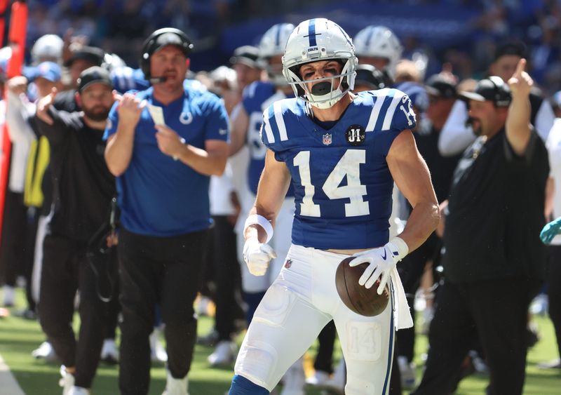Indianapolis Colts wide receiver Alec Pierce (14) celebrates after making a catch during the second half against the Miami Dolphins at Lucas Oil Stadium in Indianapolis on Sept. 7, 2025.