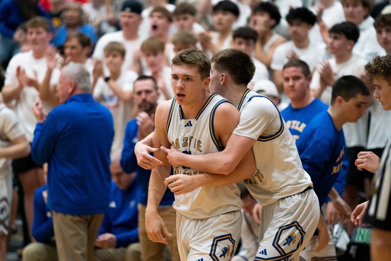 Castle's Connor Richards (30) is held back as the North Huskies play the Castle Knights during the 2026 IHSAA Sectional 16 Boys Basketball semifinals at North High School in Evansville, Ind., Friday, March 6, 2026.