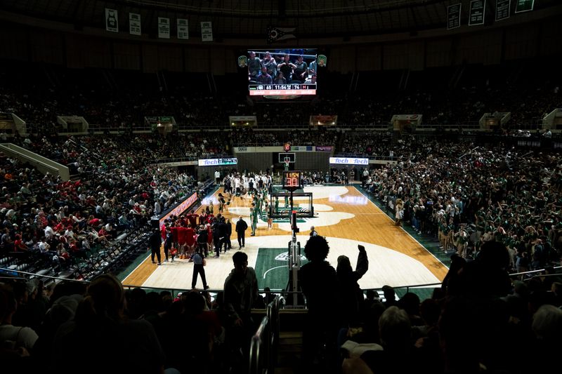 Miami RedHawks huddles up during a time out in the second half of the MAC conference final game at the Convocation Center in Athens, Ohio, on Friday, March 6, 2026.