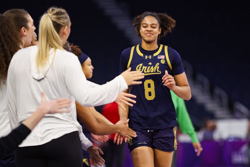Mar 6, 2026; Duluth, GA, USA; Notre Dame Fighting Irish guard Cassandre Prosper (8) celebrates with teammates after being removed from a game against the North Carolina State Wolfpack in the fourth quarter at Gas South Arena. Mandatory Credit: Brett Davis-Imagn Images