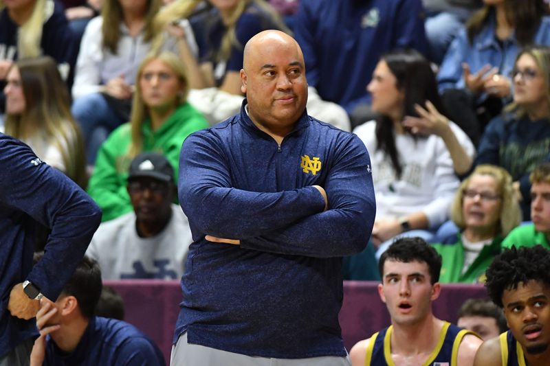 Jan 17, 2026; Blacksburg, Virginia, USA; Notre Dame Fighting Irish head coach Micah Shrewsberry looks at the official during the first half at Cassell Coliseum. Mandatory Credit: Brian Bishop-Imagn Images