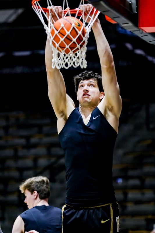 Raleigh Burgess flushes a dunk home before Purdue's game against Wisconsin on Mar. 7, 2026, at Mackey Arena in West Lafayette, IN.