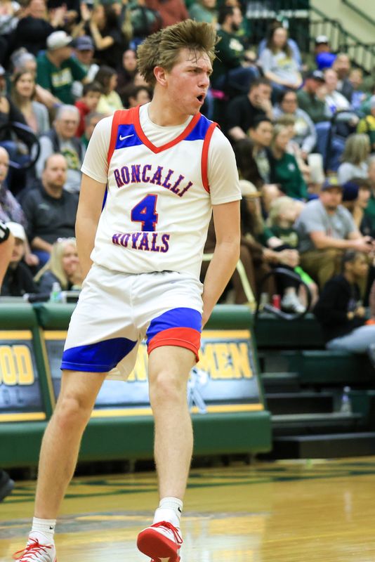Roncalli Joey Ortman (4) reacts to his successful 3 point basket as Roncalli took on Greenwood High School in the IHSAA S28 Class 3A Boys Basketball State Tournament Championship, Mar 7, 2026; Greenwood, IN, USA; at Greenwood High School.