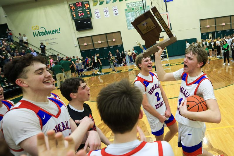 Roncalli celebrates their 56-44 victory as Roncalli took on Greenwood High School in the IHSAA S28 Class 3A Boys Basketball State Tournament Championship, Mar 7, 2026; Greenwood, IN, USA; at Greenwood High School.