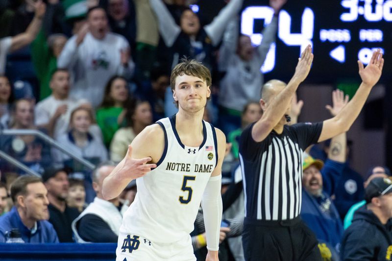 Feb 28, 2026; South Bend, Indiana, USA; Notre Dame Fighting Irish guard Cole Certa (5) celebrates making a 3-point shot during overtime at Purcell Pavilion at the Joyce Center. Mandatory Credit: Michael Caterina-Imagn Images