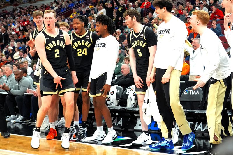 Mar 13, 2026; Chicago, IL, USA; Purdue Boilermakers guard Fletcher Loyer (2) celebrates with the bench after making a three-point basket against the Nebraska Cornhuskers during the second half at United Center. Mandatory Credit: David Banks-Imagn Images
