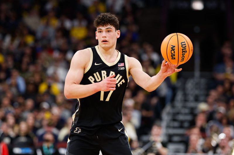 Mar 15, 2026; Chicago, IL, USA; Purdue Boilermakers guard Omer Mayer (17) passes the ball during the first half against the Michigan Wolverines during the men's Big Ten Conference Tournament Championship at United Center. Mandatory Credit: Kamil Krzaczynski-Imagn Images