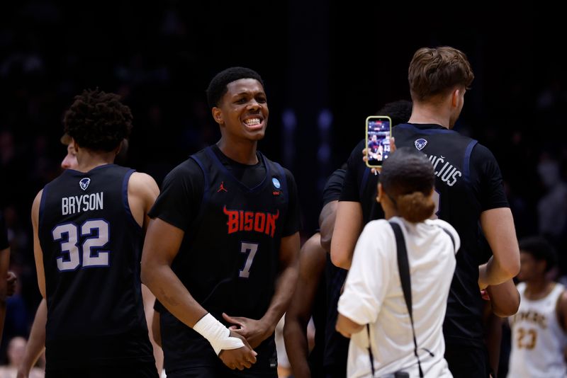 Mar 17, 2026; Dayton, OH, USA; Howard Bison forward Julian Johnson (7) celebrates after defeating the UMBC Retrievers during a first four game of the men's 2026 NCAA Tournament at University of Dayton Arena. Mandatory Credit: Rick Osentoski-Imagn Images