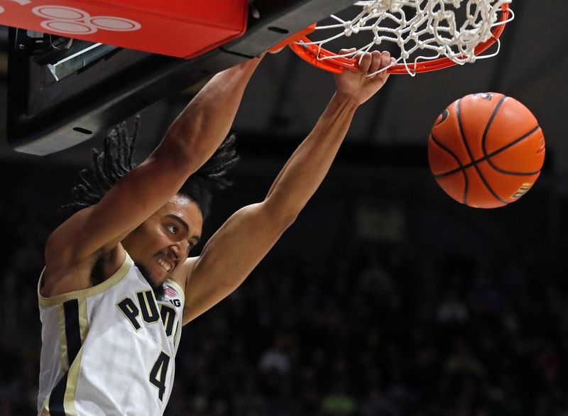 Purdue Boilermakers forward Trey Kaufman-Renn (4) dunks the ball during the menâ€™s basketball exhibition game against Grace College, Wednesday, Nov. 1, 2023, at Mackey Arena in West Lafayette, Ind. Purdue Boilermakers won 98-51.