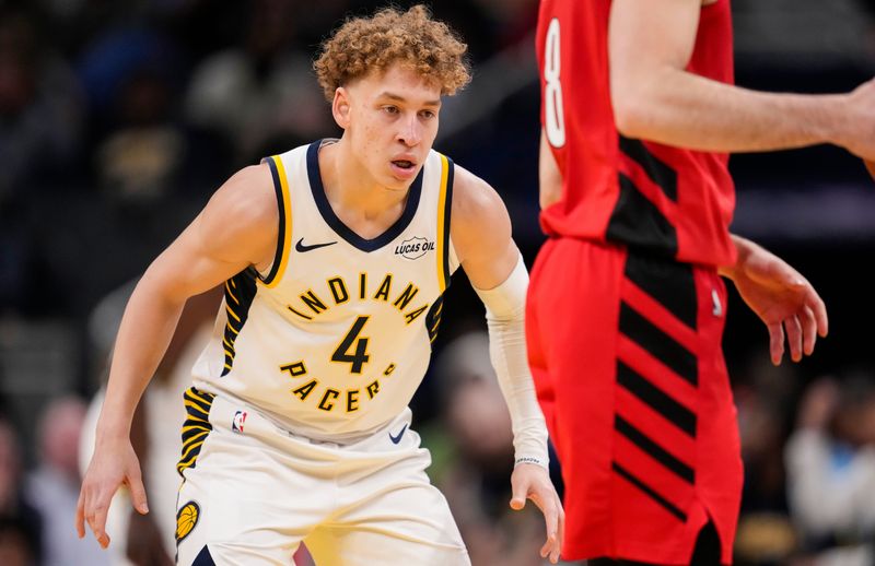 Indiana Pacers guard Taelon Peter (4) watches the ball Wednesday, March 18, 2026, during the game at Gainbridge Fieldhouse in Indianapolis. The Portland Trail Blazers defeated the Indiana Pacers, 127-119.