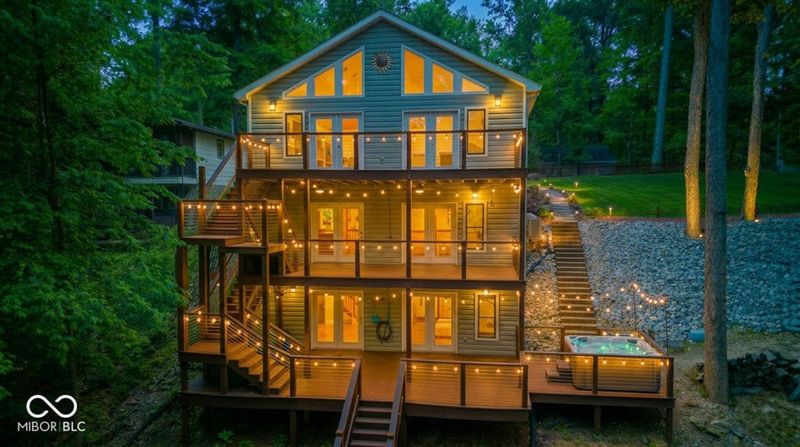 This $1M home has 3 levels, 2 bedrooms, 4 baths, and several bonus rooms with lake views.