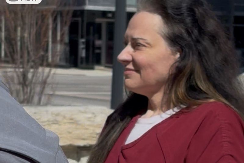 Amanda Milsap, accused of bribing a state's witness not to testify against her ex-husband, is escorted into the Tippecanoe County Courthouse on Thursday, March 19, 2026.