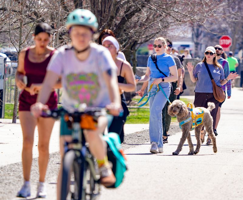 Hoosiers head outdoors to enjoy the second day of spring on Saturday, March 21, 2026, in Indianapolis.