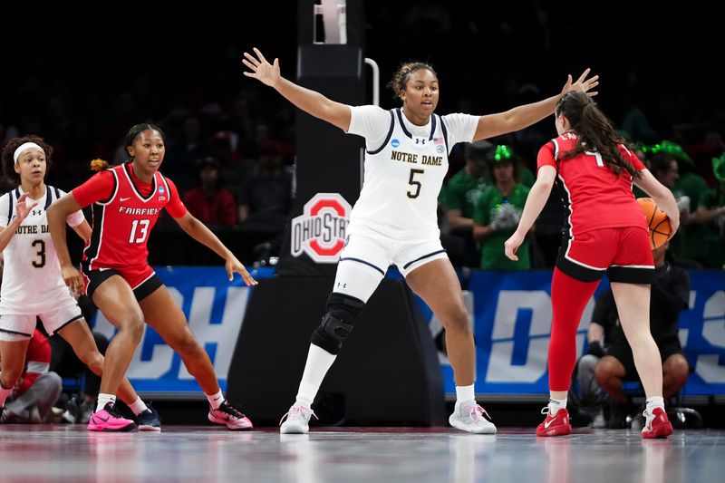 Mar 21, 2026; Columbus, Ohio, USA; Notre Dame Fighting Irish forward Malaya Cowles (5) defends Fairfield Stags guard Kaety L'amoreaux (4) during the first round of the NCAA women's basketball tournament at Schottenstein Center. Mandatory Credit: Adam Cairns-Imagn Images via USA TODAY Network