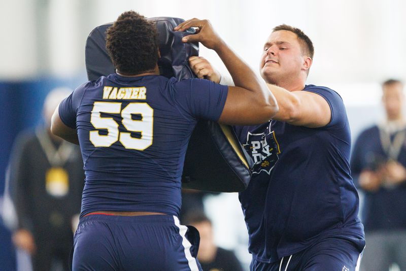 Offensive lineman Billy Schrauth, right, during Notre Dame football's Pro Day at Irish Athletic Center on Tuesday, March 24, 2026, in South Bend.