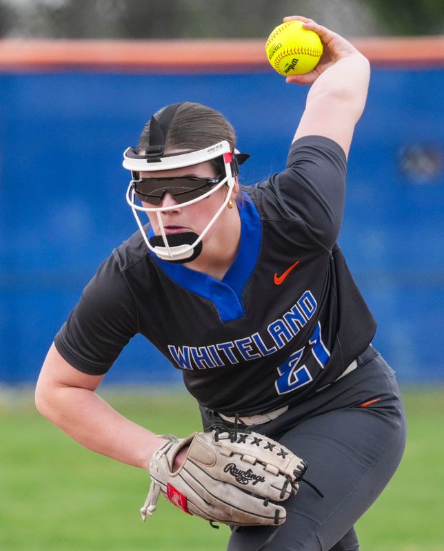 Whiteland Jordyn Crouch (21) throws a pitch Wednesday, March 25, 2026, during a softball game between Whiteland and Franklin Central at Whiteland Community High School. Whiteland won, 10-0, in five innings.