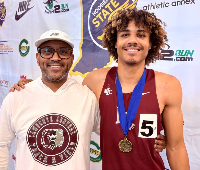 Evan Williams and his father, Lawrence Central hurdles coach Micah Williams.