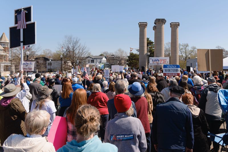 Demonstrators rally in opposition to President Donald Trump's administration during a third "No Kings" protest on Saturday, March 28, 2026, held along the Ohio River in Evansville, Indiana.