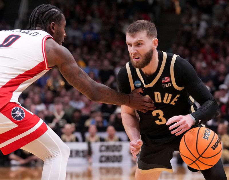 Purdue Boilermakers guard Braden Smith (3) looks to get past Arizona Wildcats guard Jaden Bradley (0) during a NCAA Tournament game Saturday, March 28, 2026 at SAP Center in San Jose, Calif. Purdue fell to Arizona 79-64.