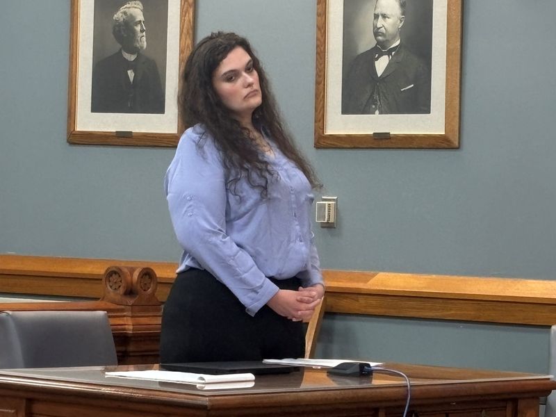Grace Lescalleet stands Monday, March 30, 2026, at her sentencing hearing for reckless homicide in the car accident that killed her 3-year-old brother, Wyatt Mohr.