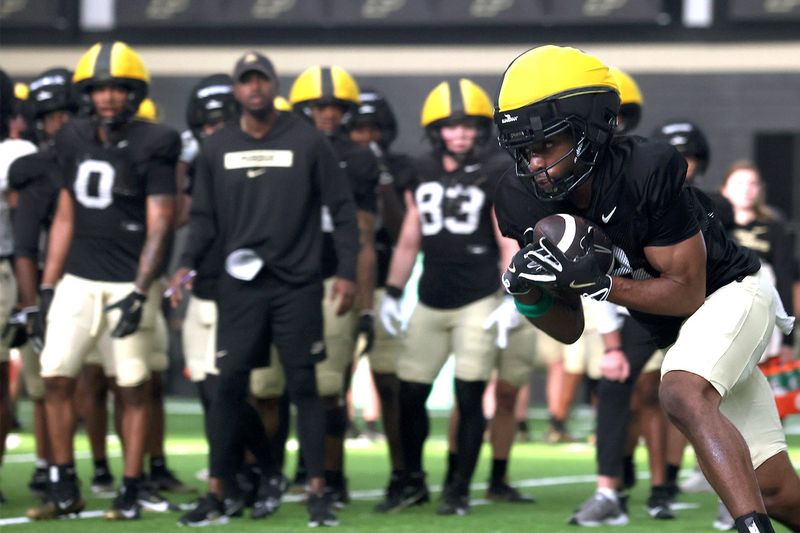 Purdue senior wide receiver De'Nylon Morrissette runs with the ball during spring training on Tuesday, March 31, 2026, at Schleicher Field in West Lafayette, Ind. Morrissette did not appear in any games in 2025 due to an injury.