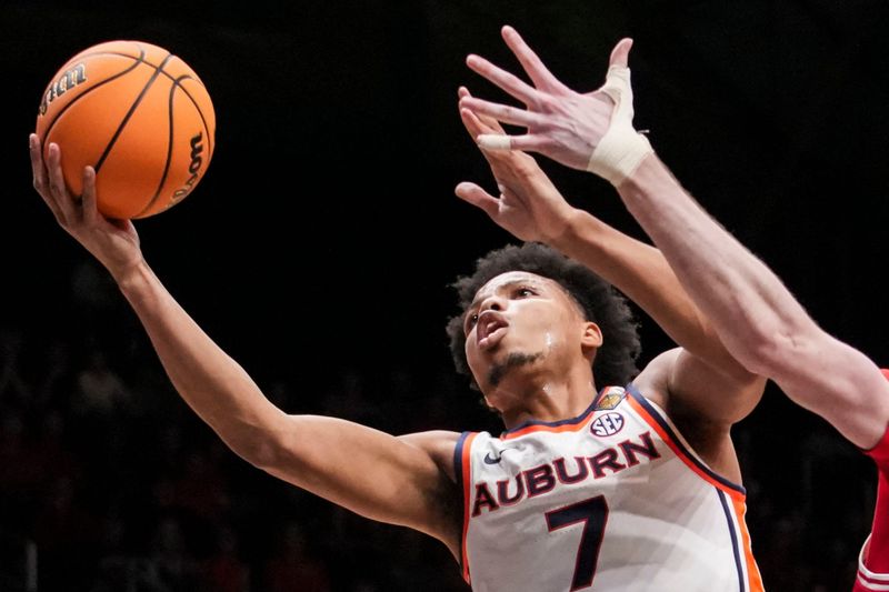 Auburn Tigers guard Keyshawn Hall (7) goes up for a basket against Illinois State Redbirds forward Brandon Lieb (12) on Thursday, April 2, 2026, during an NIT semifinals matchup at Hinkle Fieldhouse in Indianapolis.