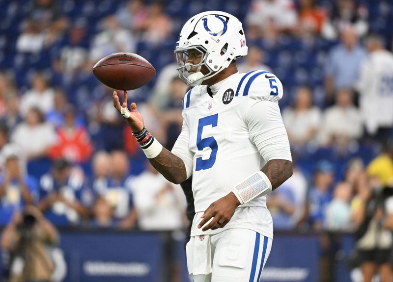 Sep 14, 2025; Indianapolis, Indiana, USA; Indianapolis Colts quarterback Anthony Richardson Sr. (5) warms up prior to the game against the Denver Broncos at Lucas Oil Stadium. Mandatory Credit: Robert Goddin-Imagn Images