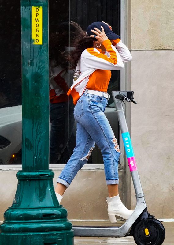 Fans flee high wind and heavy rain as storms roll in during the Men's Final Four Tournament on Saturday, April 4, 2026, in Indianapolis.