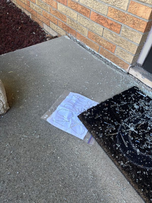 City-County Councilor Ron Gibson, District 8, said he awoke to gunshots fired at his home around 12:45 a.m. on April 6. Bullets and a note reading "No Data Centers" seen on his porch.