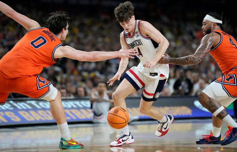 UConn Huskies guard Braylon Mullins (24) drives Saturday, April 4, 2026, through a host of Illinois Fighting Illini defenders during a Final Four game at Lucas Oil Stadium in Indianapolis.