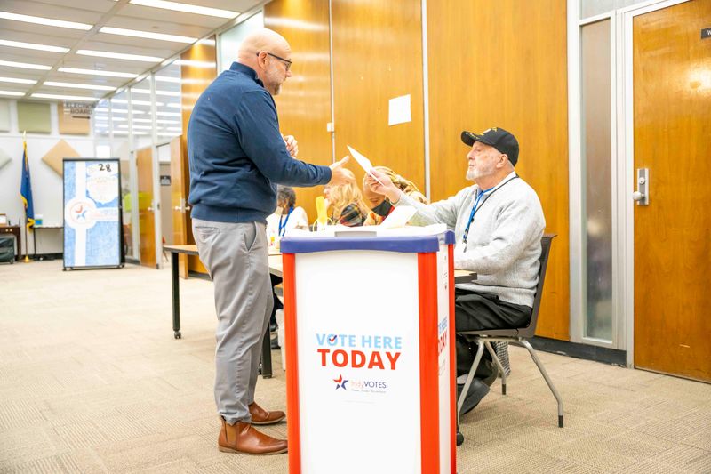 Collin Hill voted early because its convenient for him because he works in the building during early voting at the City County building Tuesday, April 7, 2026, in Indianapolis.