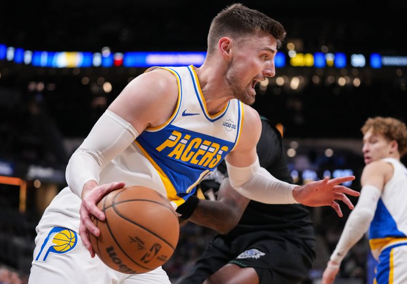 Indiana Pacers center Micah Potter (11) rushes up the court Tuesday, April 7, 2026, during the game at Gainbridge Fieldhouse in Indianapolis.