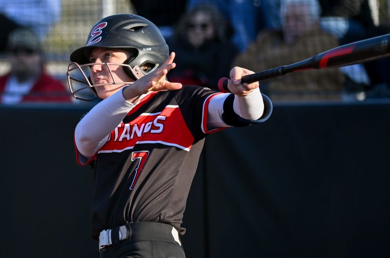 Edgewood’s Madi Bland (7) watches the ball after making contact during the softball game at South on Tuesday, April 7, 2026.