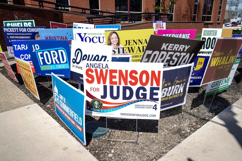 Campaign signs are posted outside the Hamilton County Government and Judicial Center on Wednesday, April 8, 2026, for early voting in Noblesville, Indiana.