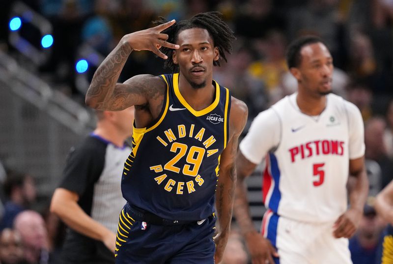 Indiana Pacers guard Quenton Jackson (29) celebrates a throw-point basket Sunday, April 12, 2026, during the game at Gainbridge Fieldhouse in Indianapolis.