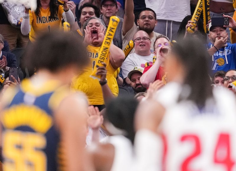 Indiana Pacers fans yell as Detroit Pistons forward Isaiah Stewart (28) shoots a free-throw Sunday, April 12, 2026, during the game at Gainbridge Fieldhouse in Indianapolis.
