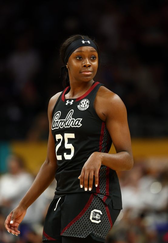 Apr 3, 2026; Phoenix, AZ, USA; South Carolina Gamecocks guard Raven Johnson (25) against the UConn Huskies during the semifinal of the Final Four of the women's 2026 NCAA Tournament at Mortgage Matchup Center. Mandatory Credit: Mark J. Rebilas-Imagn Images