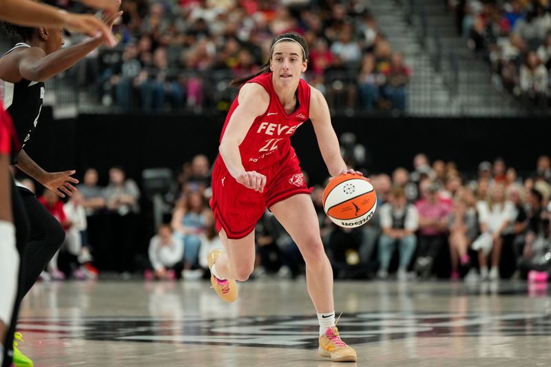Jun 22, 2025; Las Vegas, Nevada, USA; Indiana Fever guard Caitlin Clark (22) dribbles the ball during the second half of a WNBA basketball game against the Las Vegas Aces at T-Mobile Arena. Mandatory Credit: Lucas Peltier-Imagn Images