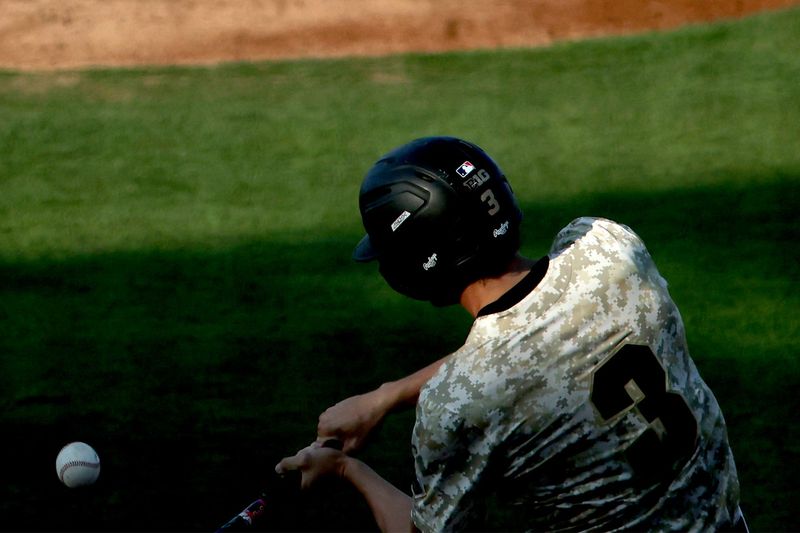 Purdue senior outfielder Eli Anderson swings to hit the ball on Tuesday, April 14, 2026, at Alexander Field in West Lafayette, Ind. Anderson was at bat five times during the game with one hit.