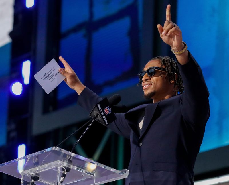 Indianapolis Colts running back Jonathan Taylor gestures to the crowd after announcing the teamâ€™s selection with the 45th overall pick during the round of the 2025 NFL Draft on Friday, April 25, 2025, at Lambeau Field in Green Bay, Wisconsin. The draft runs through April 26.
Tork Mason/USA TODAY NETWORK-Wisconsin