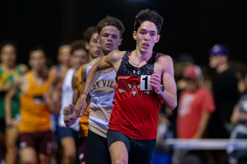 Westview High School’s Noah Bontrager leads the field into the first turn to begin the second lap of the final heat of the boys’ 1-mile run at the annual Flashes Showcase, a meet highlighted by 1-mile races, Friday, April 17, 2026, at Franklin Central High School in Indianapolis.