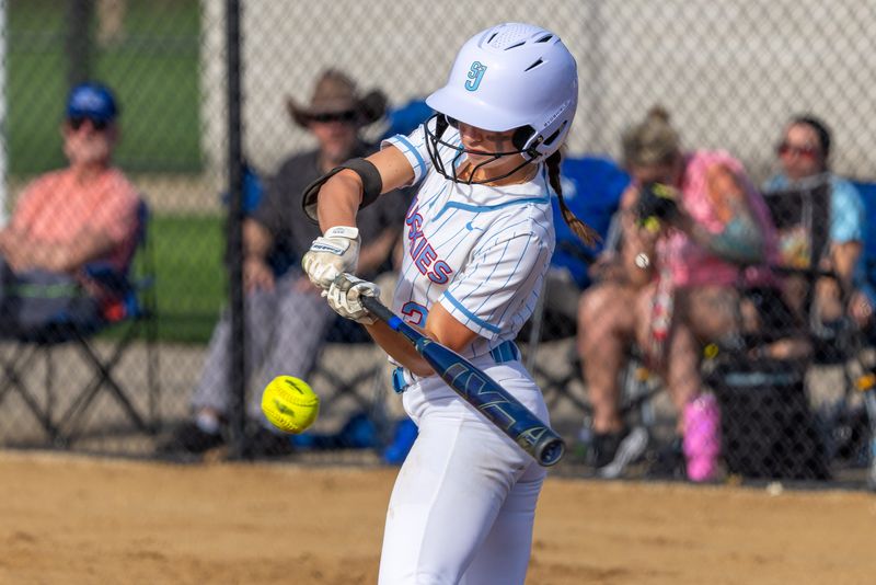 Saint Joseph’s Kiley Weinberg connects with a pitch during the Marian vs. Saint Joseph High School softball game, Friday, April 17, 2026, at the Northfield Athletic Complex.