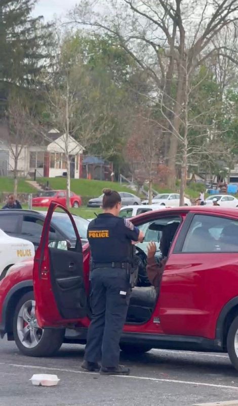 IMPD Sgt. Robyn Frazier seen pointing a firearm at an 18-year-old at Riverside Park in the 2400 block of Riverside Drive East on April 12, 2026.