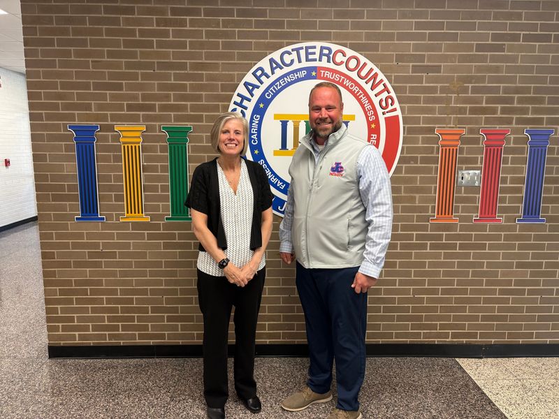 Donna Buckley stands for a photo with Jay County athletic director Alex Griffin after Buckley's unanimous approval by the Jay County school board to become the school's next girls basketball head coach on Monday, April 20, 2026.