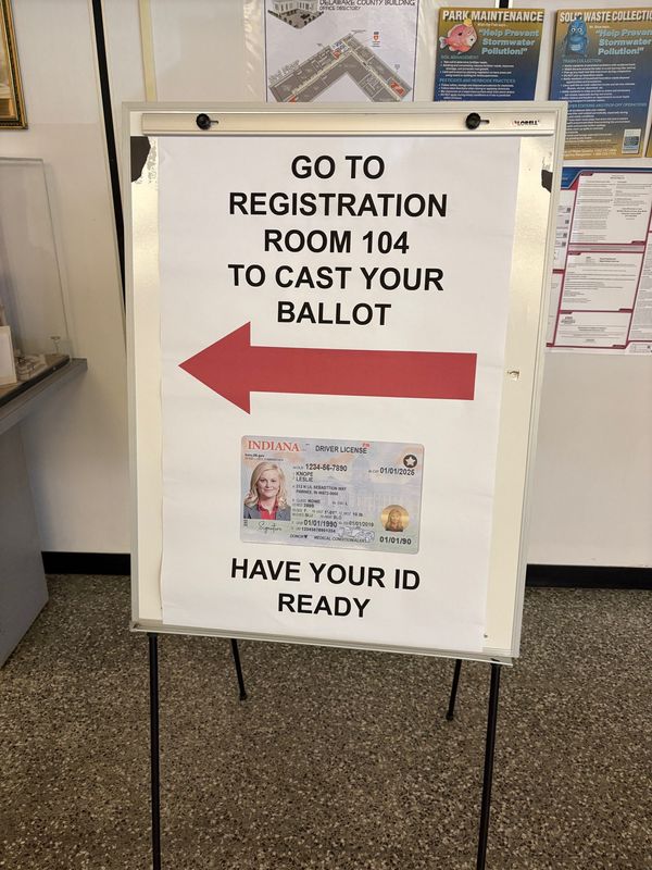 A sign directing voters to the election office in the Delaware County Building.