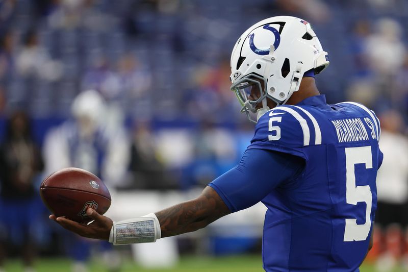 Oct 5, 2025; Indianapolis, Indiana, USA; Indianapolis Colts quarterback Anthony Richardson (5) holds a football during warmups before the game between the Las Vegas Raiders and the Indianapolis Colts at Lucas Oil Stadium. Mandatory Credit: Trevor Ruszkowski-Imagn Images