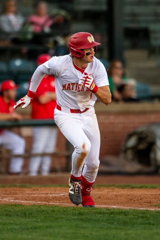 Mater Dei's Dylan Murphy (1) runs for first as the Mater Dei Wildcats host the Vincennes Lincoln Alices at Bosse Field in Evansville, Ind., Tuesday, April 21, 2026.